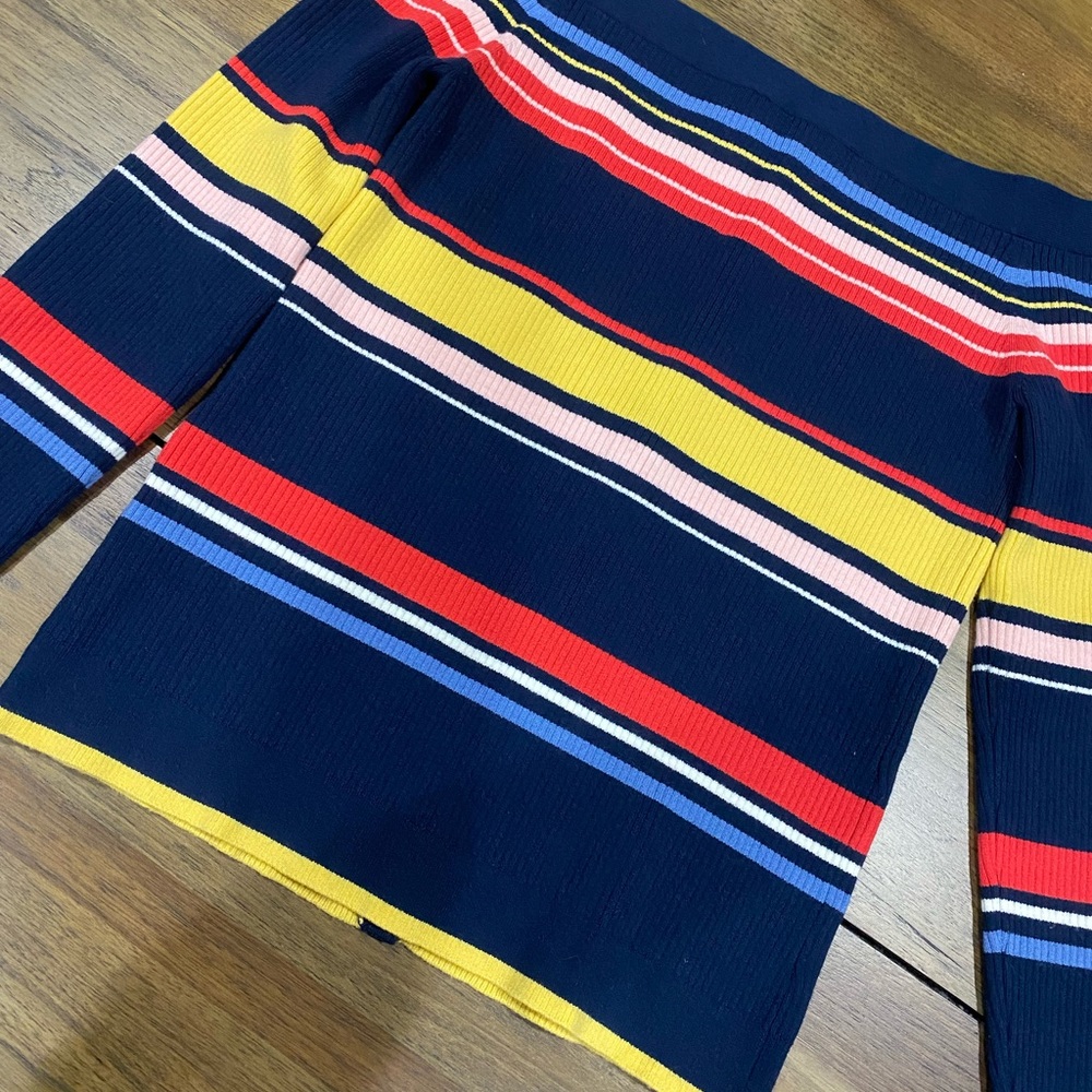 Frame colorful women’s sweater.